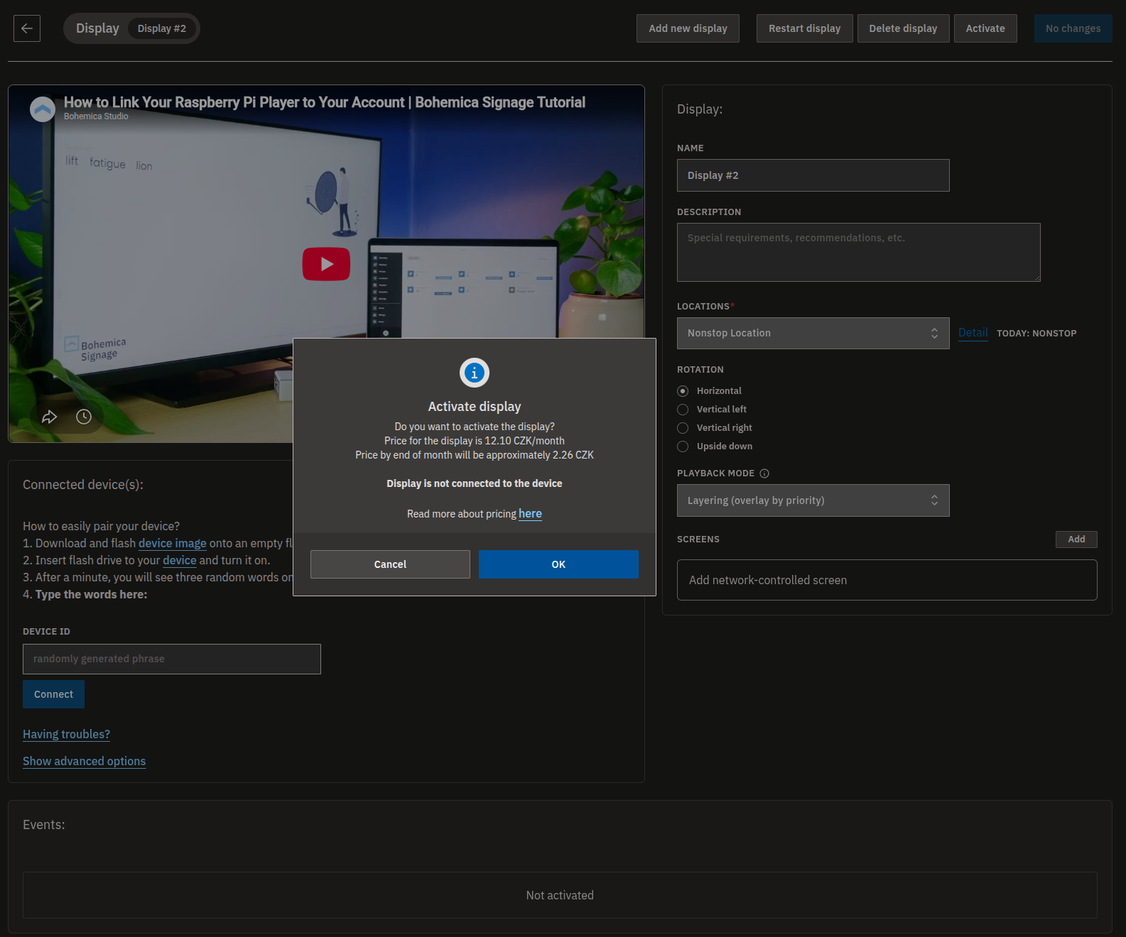 The Activate display confirmation dialog showing the monthly price and the estimated charge until the end of the month.